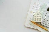 documents et calculatrice pour un remboursement de prêt immobilier
